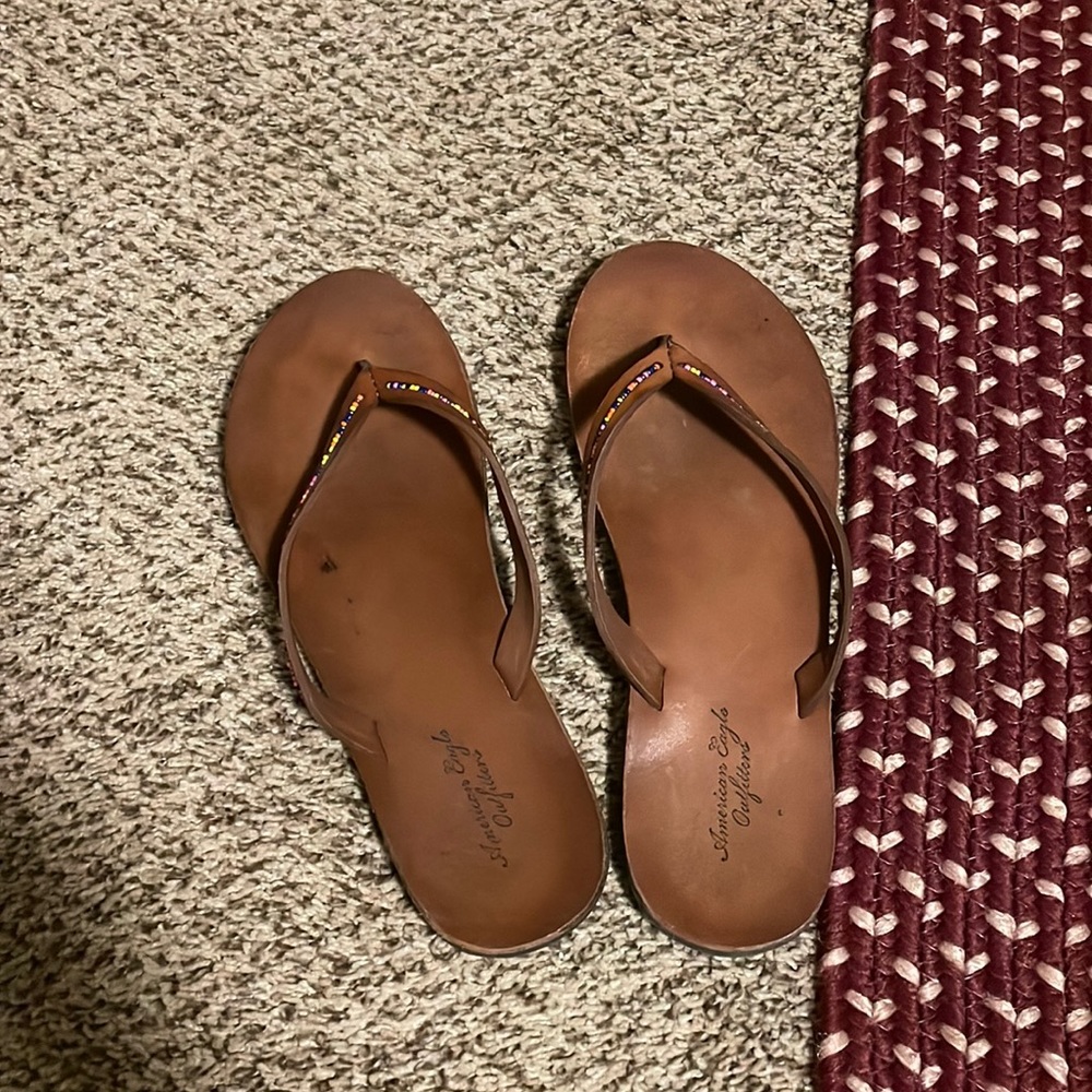 AE brown flip flops
